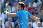 EASTBOURNE, ENGLAND - JUNE 21:  Feliciano Lopez of Spain returns against Richard Gasquet of France during their Men's Singles Finals match on day eight of the Aegon International at Devonshire Park on June 21, 2014 in Eastbourne, England. (Photo by Jan Kruger/Getty Images)